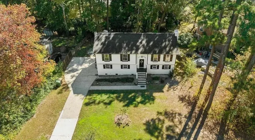 Stylish 4BR Getaway with Game Room, Grills & Cozy Outdoor Fire-Pit - Image 1