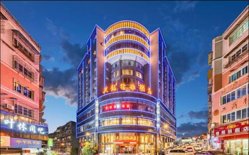 Jiulong Xinya Hotel - Image 1