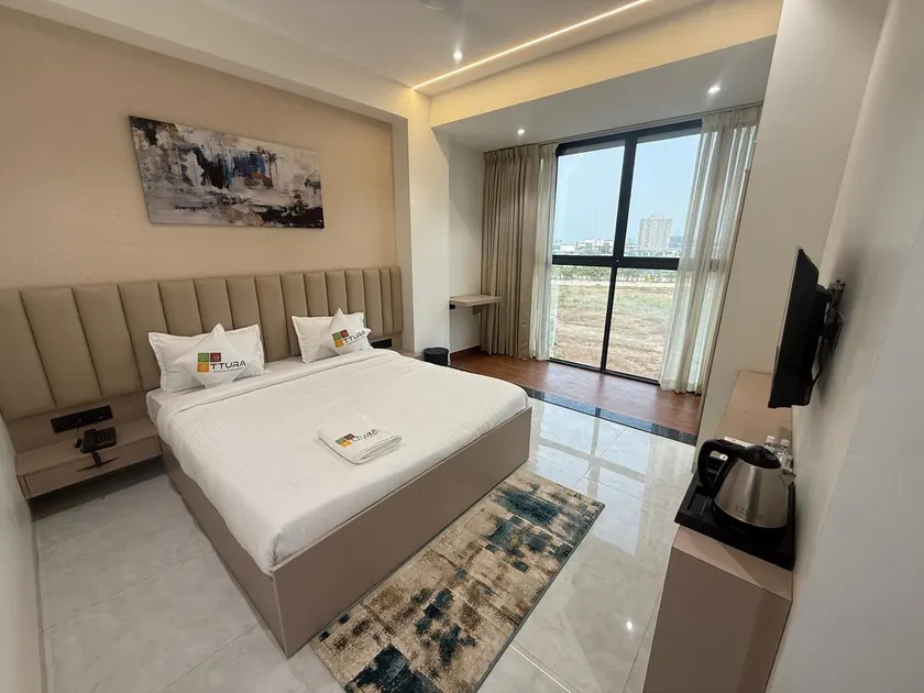 TTURA Kitchen Bar Rooftop & Rooms Pune - Image 1