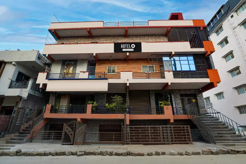 Hotel O Sri Sai Guru Comfort - Image 1