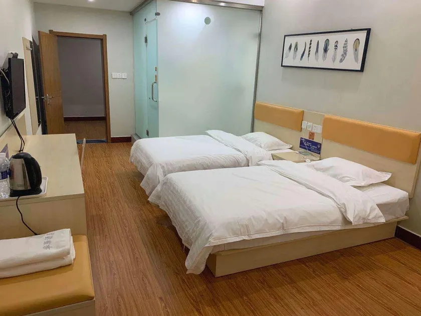 Huayi Yiju Hotel (Quzhou Guangming Street Branch) - Image 1