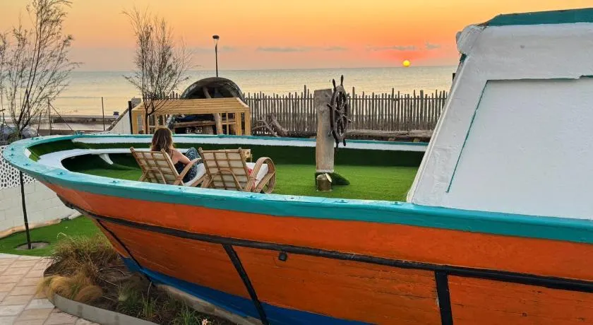 The Boat House - Beachfront Garden Home - Image 1