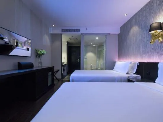 Orange Hotel Haikou Guomao Wanlv Park - Image 1