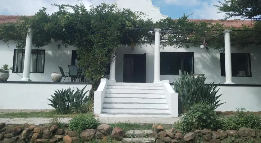 The Riverhouse Guesthouse - Image 1