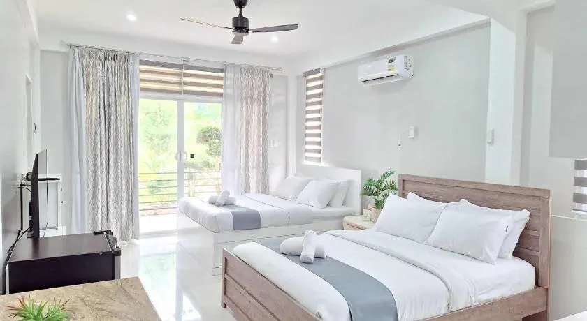 INATO SUITES Rm 2 2 queen beds - Image 1