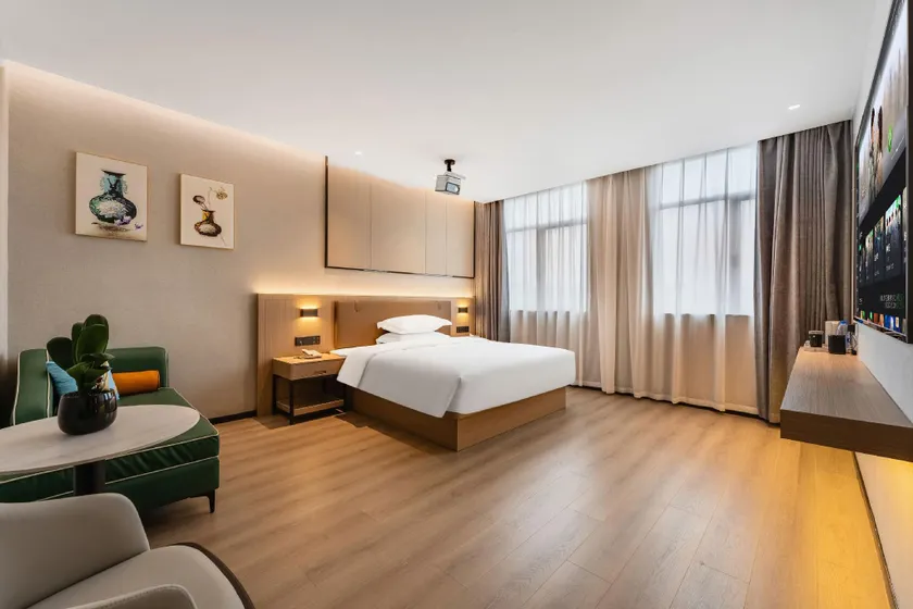 Qingfeng Huayuan Audio-Visual Hotel (Wanda Plaza Houjie Branch) - Image 1
