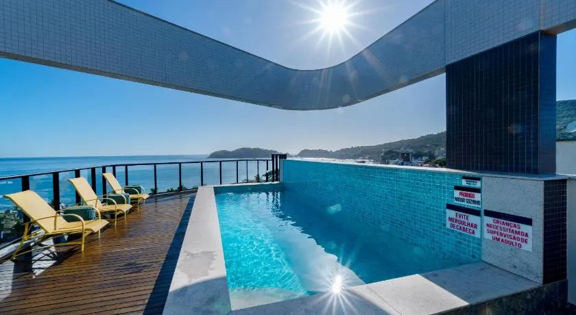 Confortável Loft com Vista para o Mar - Condomínio com Piscina - Image 1