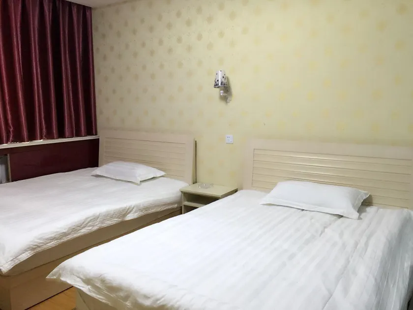 Tian Tai Business Hotel (Jiyang Branch) - Image 1
