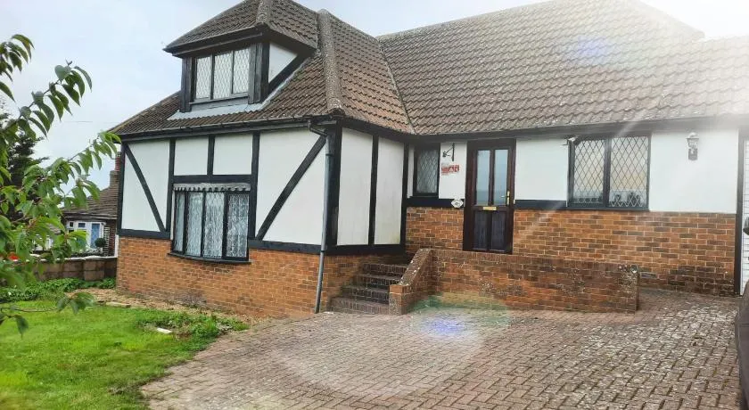 Modern Tudor home, sea views - Image 1