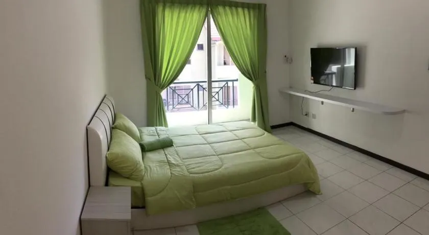 Api Api Centre Apartment Homestay - Image 1