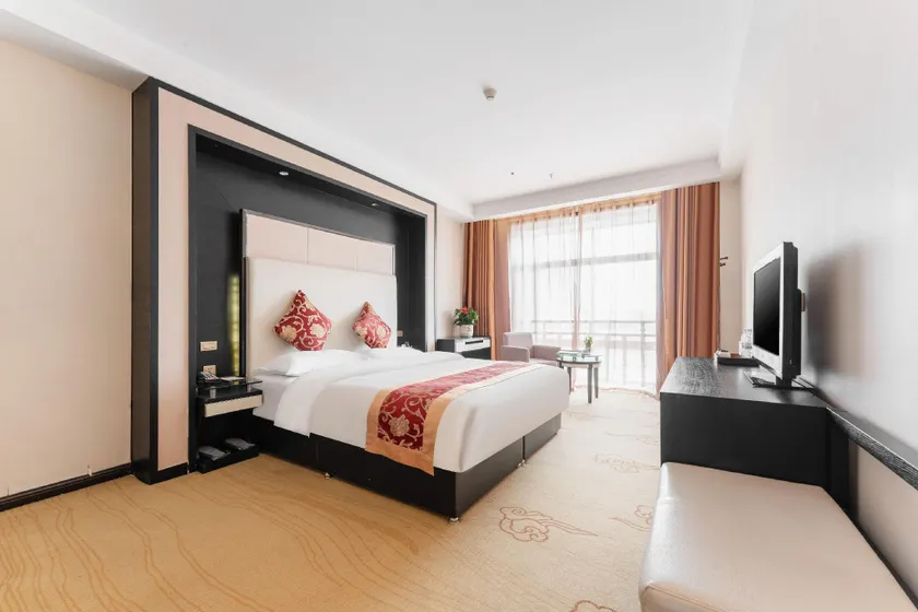 Junyi International Hotel - Image 1