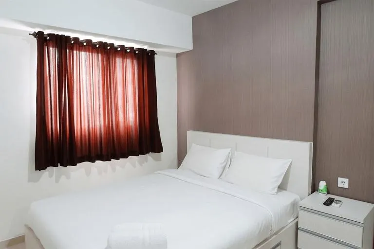 Homey 1BR at The Wave near Epicentrum Kuningan By Travelio - Image 1
