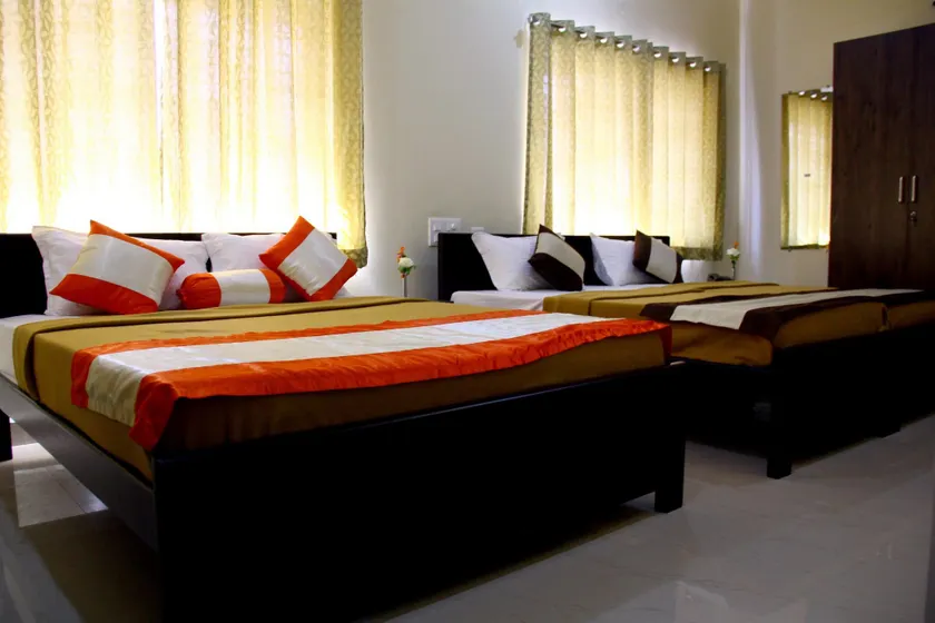 Royal Suvarna Comforts - Image 1