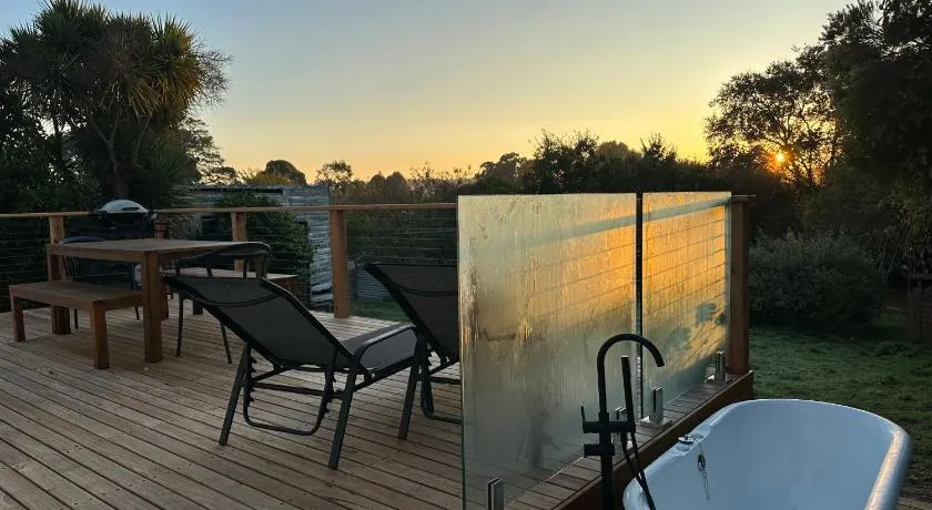 Enjoy a renovated retreat with outdoor bath - Image 1