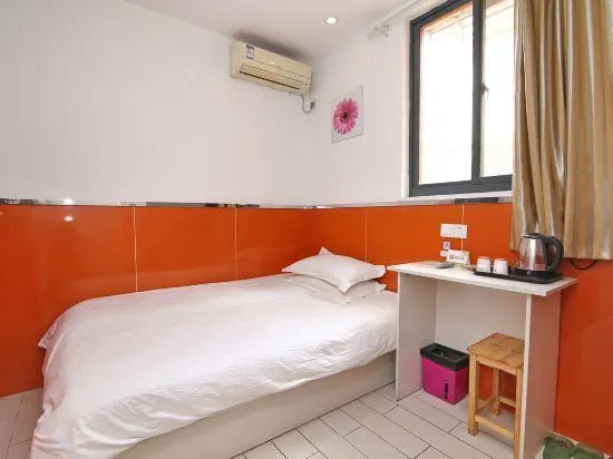 Shanghai Happy Hotel - Image 1