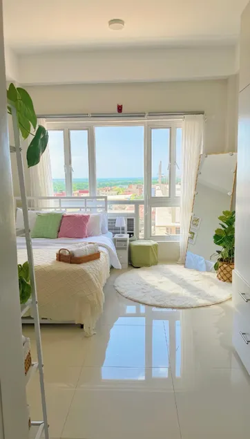 Central Dagupan Condo • Walk to Malls • Reserved Parking - Image 1