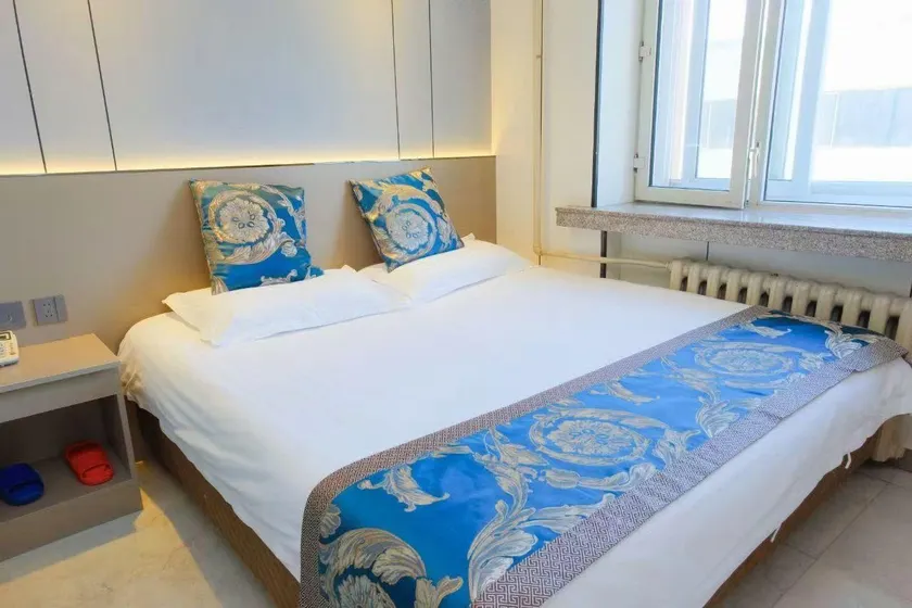 Qicai Holiday Hostel - Image 1