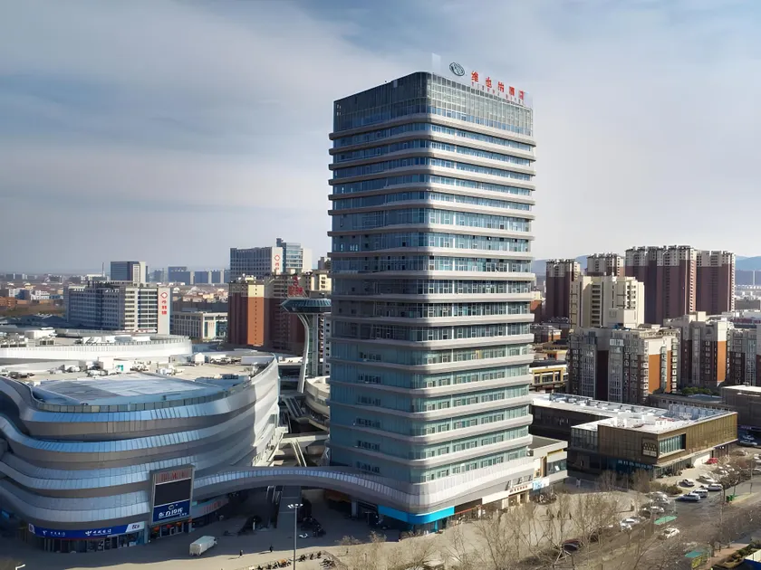 Vienna Hotel Shandong Zhangqiu Ancient City Baimaiquan - Image 1