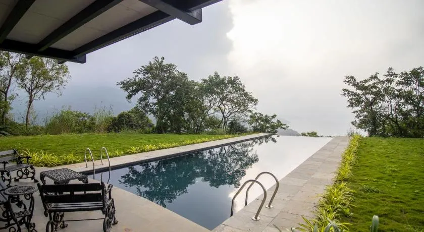 SaffronStays Solasta - 2BR luxury villa with black marble infinity pool, lotus pond & dam views in Mulshi - Image 1