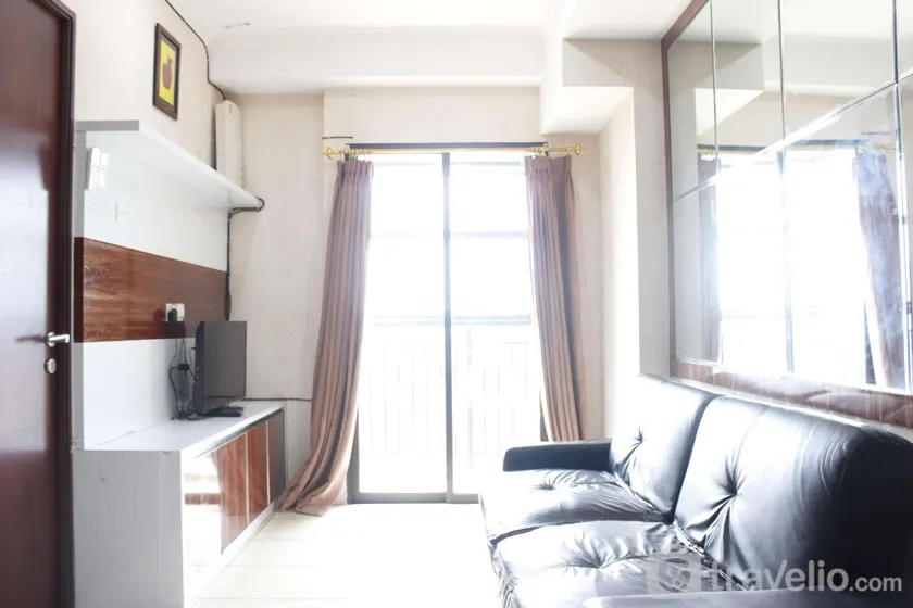 Comfy & Well Appointed 2BR at Tamansari Panoramic Apartment By Travelio - Image 1