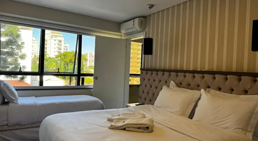 Apto Batel dentro do Hotel com Vaga e Piscina - Image 1