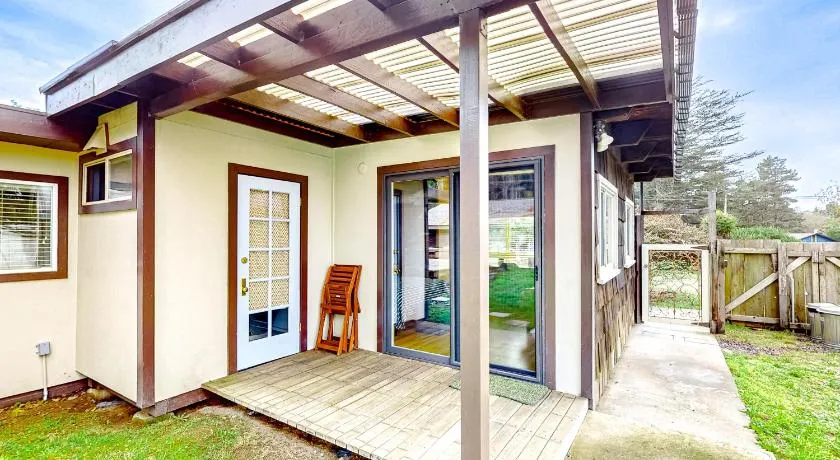 Eco-Conscious Home with Spacious Yard & EV Charger - Image 1