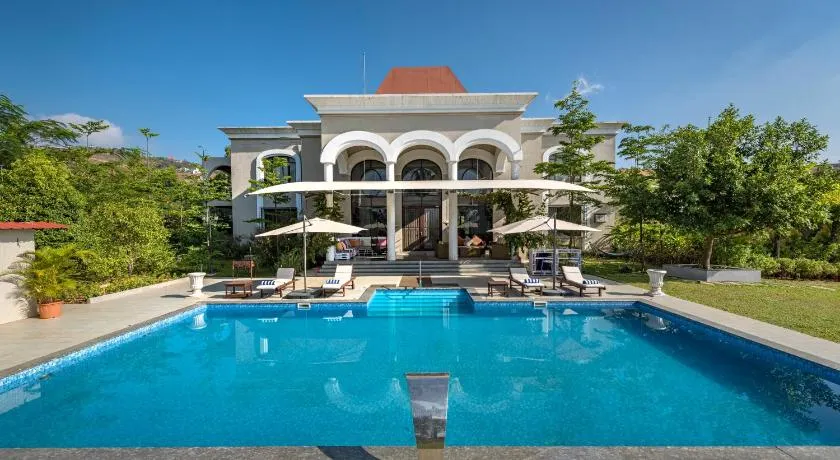 SaffronStays Zuma Villa - 7BR Villa with Heated Pool, Poker Room, Games & Huge Lawn, Pawna - Image 1