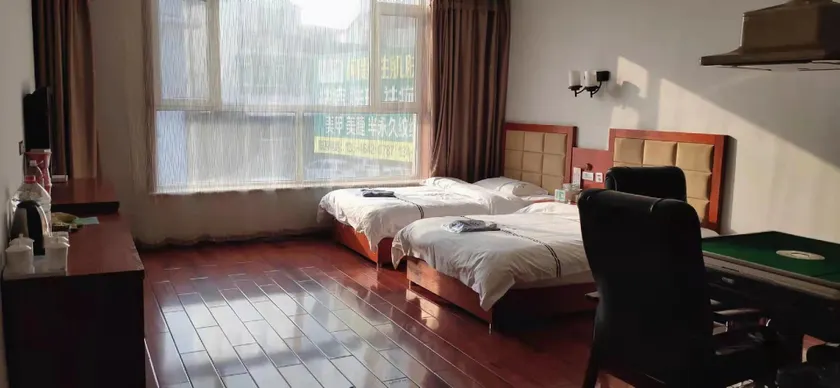 Shui Mu Nian Hua Business Hotel - Image 1