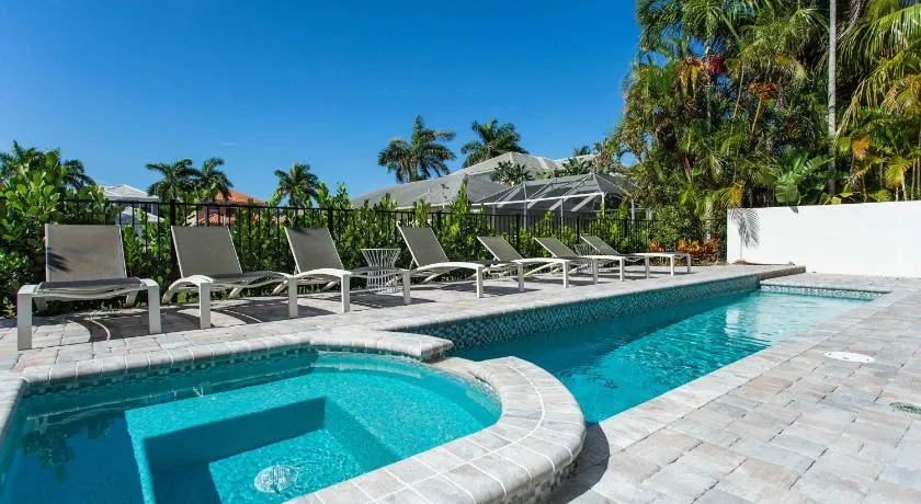 Sorrento Vacation Rental and Cabana - Spacious 6 BR Retreat with Private Pool and Hot Tub! Pet Friendly, steps from Vanderbilt Beach with separate Cabana - Perfect for Large Groups and Families! - Image 1