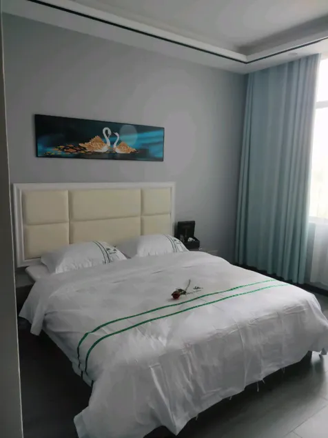 Xingren Green Island Hotel - Image 1