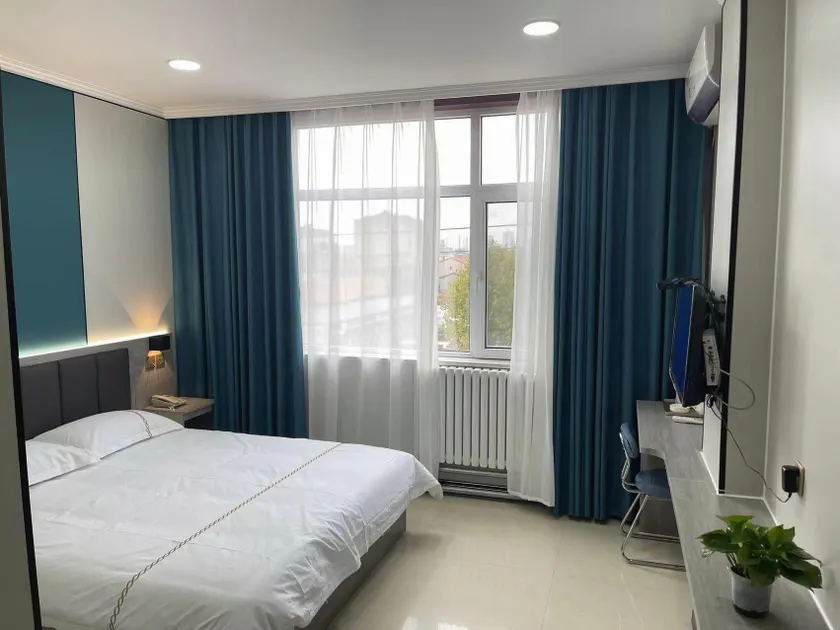 Longdu Business Hotel - Image 1