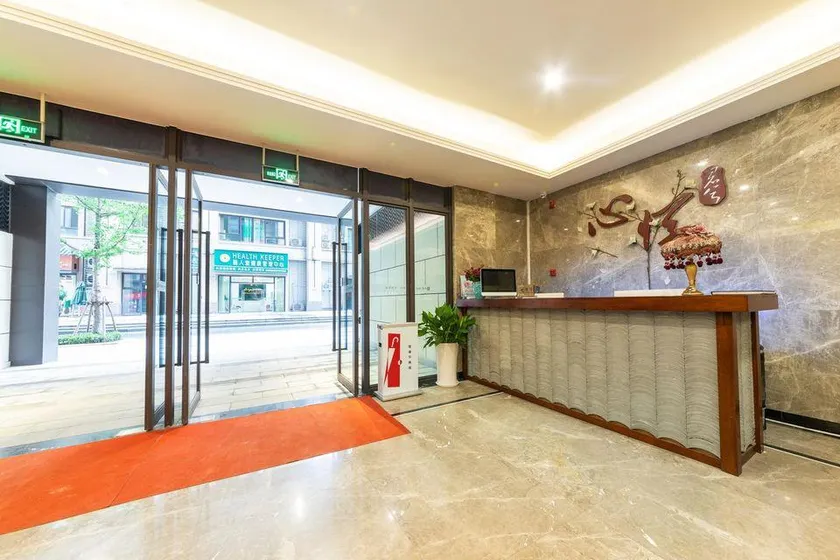 Xinyue Junxi Hotel - Image 1