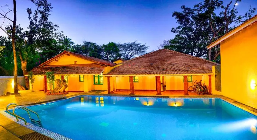 ELIVAAS Signature Terra Rosa Portuguese-styled 4-BHK Villa With Private Pool, Garden, Veranda & Sit-out Area - Image 1