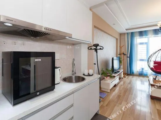 Mango Business Holiday Apartment (Dalian South China Plaza) - Image 1