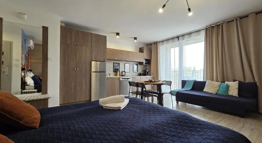 Q Apart GRAND - 3 pokojowe klimatyzowane apartamenty przy Manufakturze z garażem Gratis, FV - Image 1
