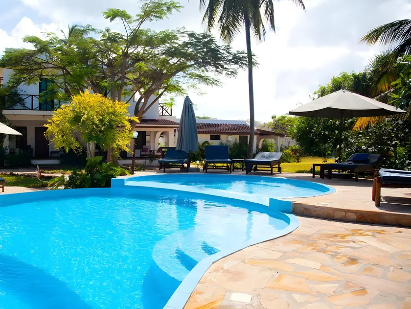 Flame Tree Cottages - Image 1