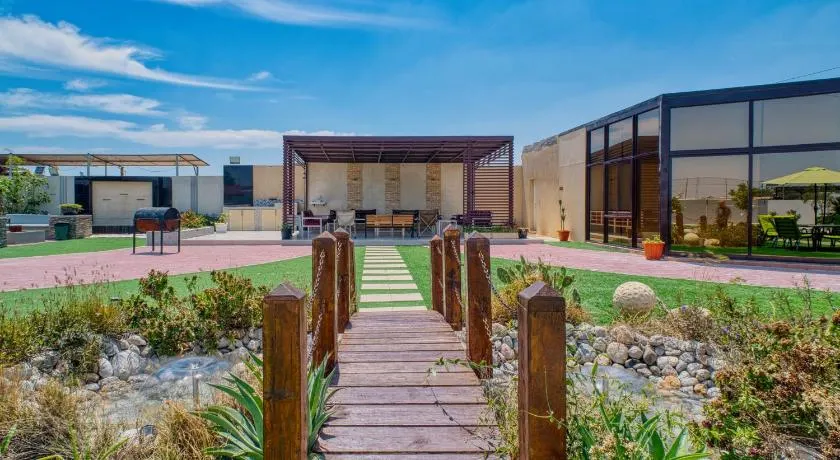 Farm stay 3 majlis Heated Pool 4BR 10 extra mattress - Image 1