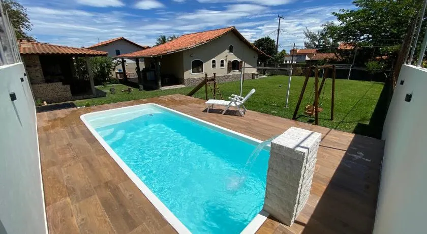 Casa com piscina, ar condicionado, campo de futebol e área gourmet a um quarteirão da lagoa de Praia Seca - Image 1