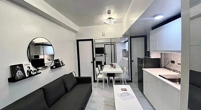 Chic and Cozy Minimalist Condo with Pool in Makati City - Image 1