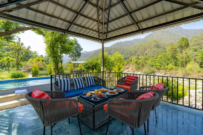 Prakriti with River View- Pet Friendly Retreat with Plunge Pool by StayVista - Image 1