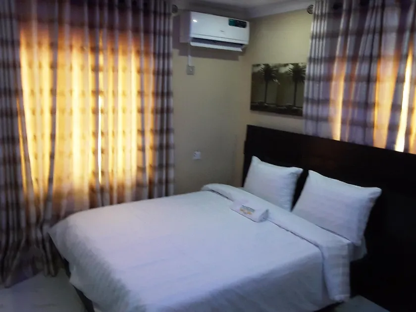 Indigem Hotel and Suites - Image 1