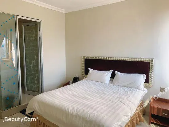 Shengtang Business Hotel - Image 1