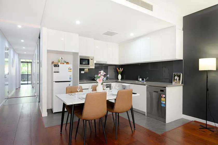 Ryde Warm 2BR Stay with Pool near Train Station - Image 1