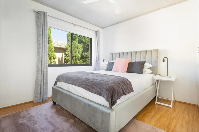 Unit With Balcony, Backyard and Parking Near Shops - Image 1