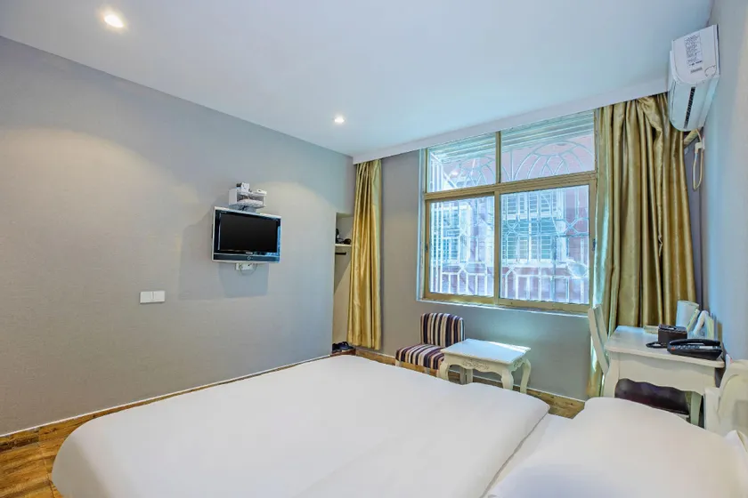 Aishang Nanbowan Theme Hotel (Shishi Taihe Plaza Branch) - Image 1