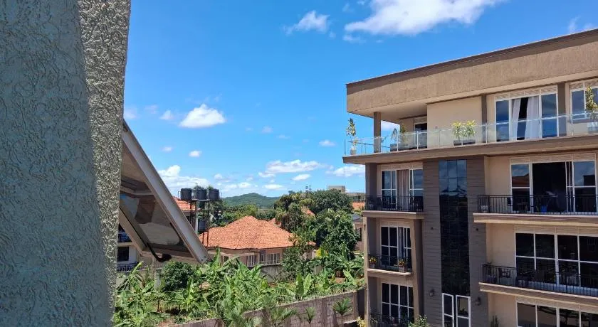 Serengeti Apartments near Speke Resort with Housekeeping, Netflix, Wi-Fi, Airport Proximity - Image 1