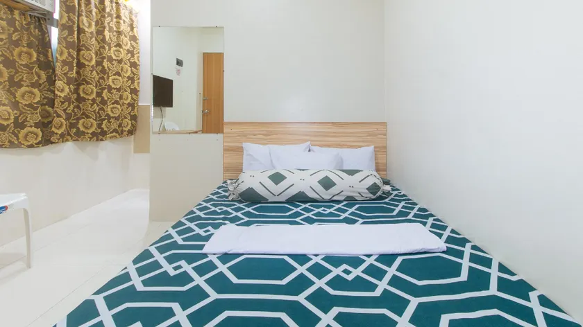 CM Apartelle Iloilo International Airport by RedDoorz - Image 1