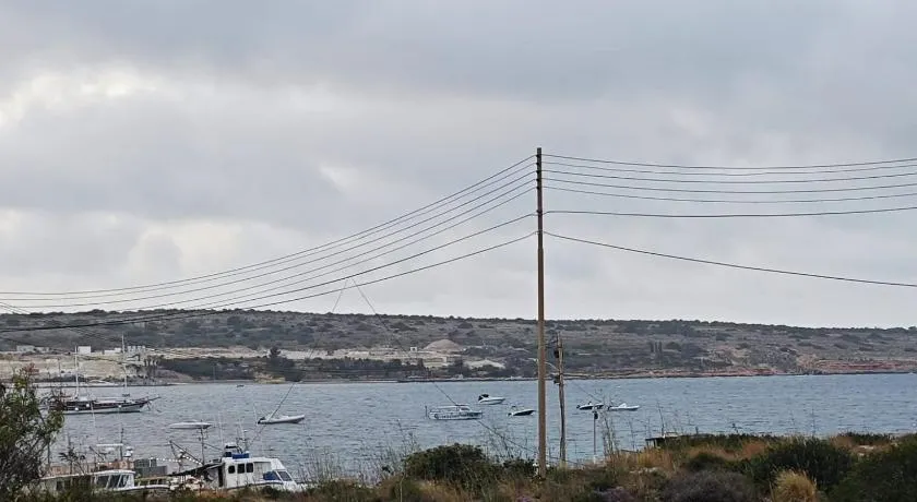 Coastal Charm Ghadira Bay Flat - Image 1