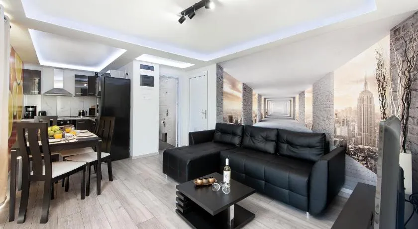 Appartement avec terrasse, jardin et jacuzzi | Vue jardin - Image 1