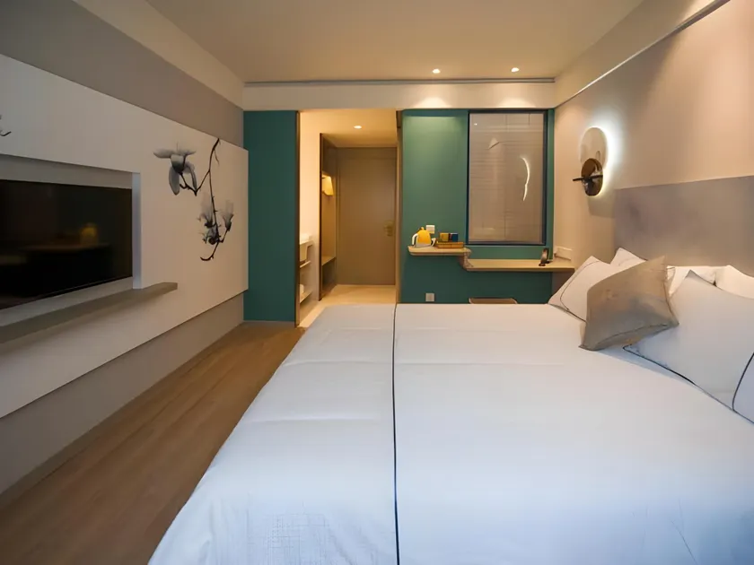 Magnotel Hotel Qionghai Wanquanhe Aihua Road - Image 1